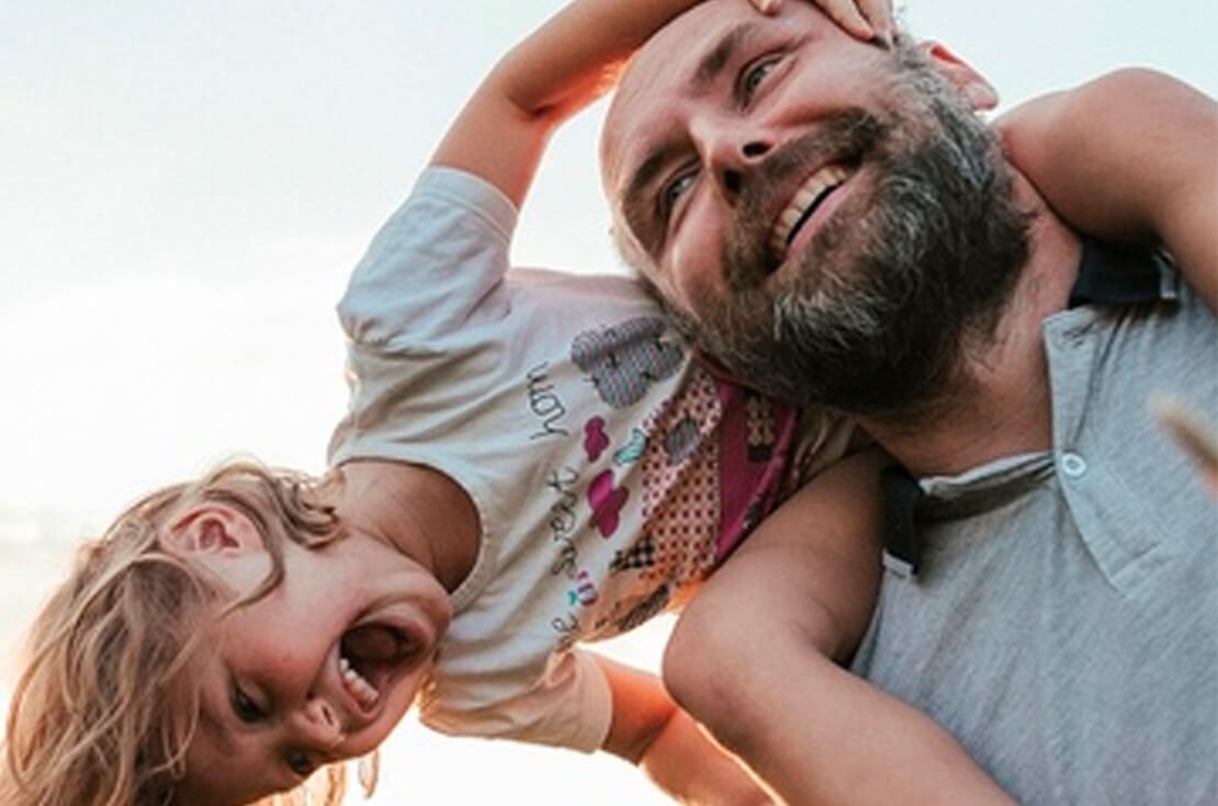 Father playing with daughter